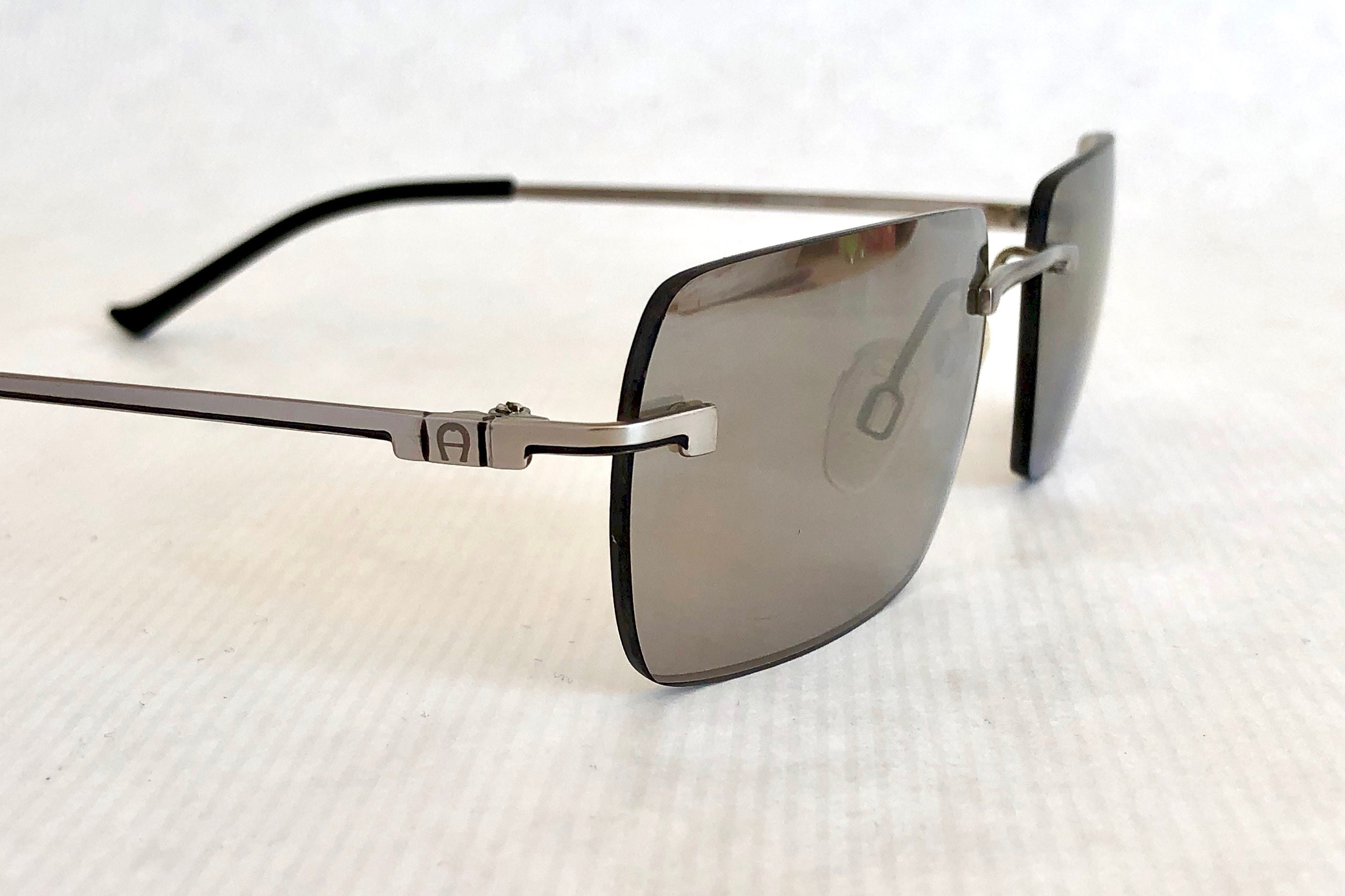 Lunettes Vintage Aigner A1022 - Titane Et Or Rose - Demi-monture Ovale - NOS (neuf Sans étiquette)