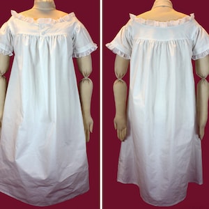 May include: A white cotton nightgown with a ruffled neckline and short sleeves. The gown is gathered at the waist and has a simple, classic design.
