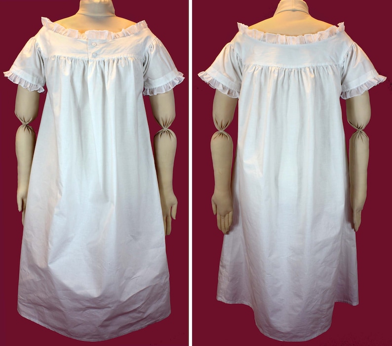 May include: A white cotton nightgown with a ruffled neckline and short sleeves. The gown is gathered at the waist and has a simple, classic design.