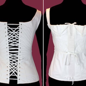 May include: A white cotton corset with a lace-up back and a gathered front. The corset is shown from the front and back.