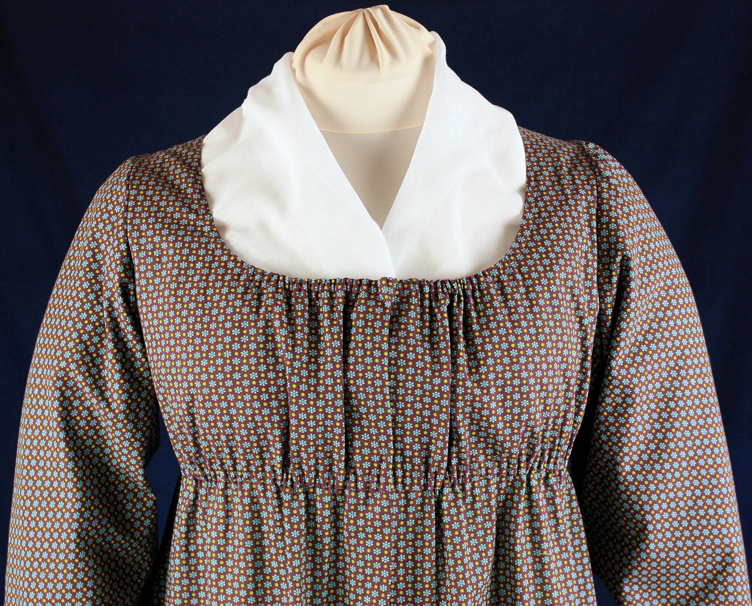 Empire / Regency dress with front clousure, apron, cap and fichu about