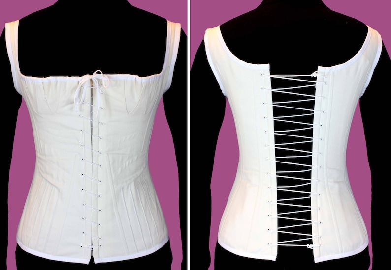 May include: A white cotton corset with a lace-up back and a front closure. The corset is made of a lightweight fabric and has a simple design.