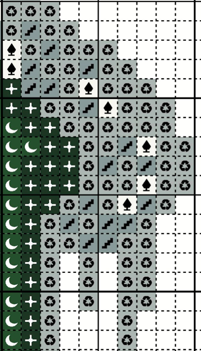 May include: Green and white cross stitch pattern with a crescent moon, plus signs, and other symbols. The pattern is on a white grid.