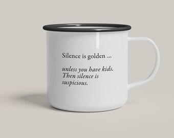 May include: White enamel mug with a black rim and handle. The mug has a quote printed on it: "Silence is golden... unless you have kids. Then silence is suspicious." The quote is attributed to @studio.typealive.