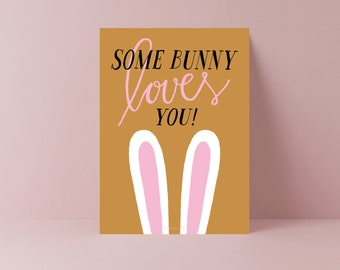 Kaart voor Pasen / Some Bunny Loves You / zoete paaskaart met paashaas en woordspeling met liefde en grappige gezegde als paascadeau