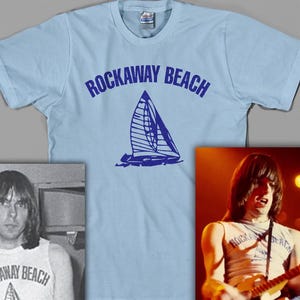 RAMONES / ラモーンズ [Worn Free] Johnny Ramone / Rockaway Beach Tee (Light Blue) Ramones T-Shirt. Johnny Ramone wearing a New Mexico Tee