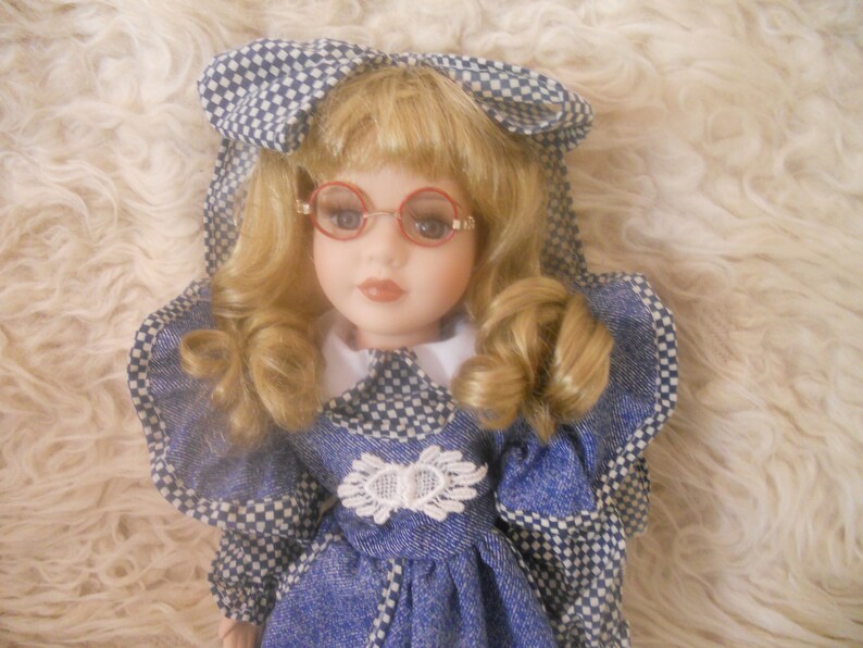 Ashley Belle Collection Yvette Porcelain Doll. image 0