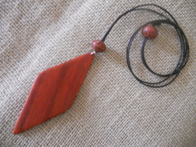 Exotic Wood Padauk Pendant. Double Sided Portable Red Wooden Jewelry Necklace.Handcrafted Necklace Wooden Art. Women's necklace. image 3