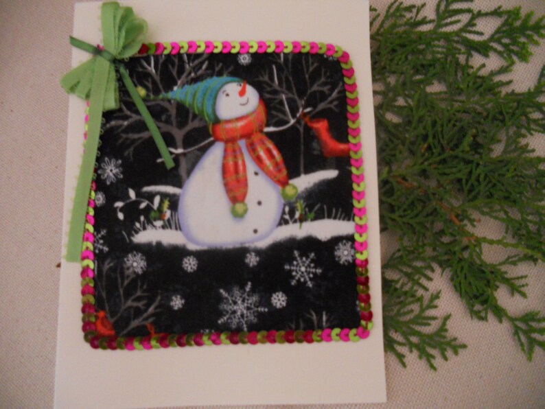 Christmas Greeting Card. Holiday Snowman with a Green Bow image 0