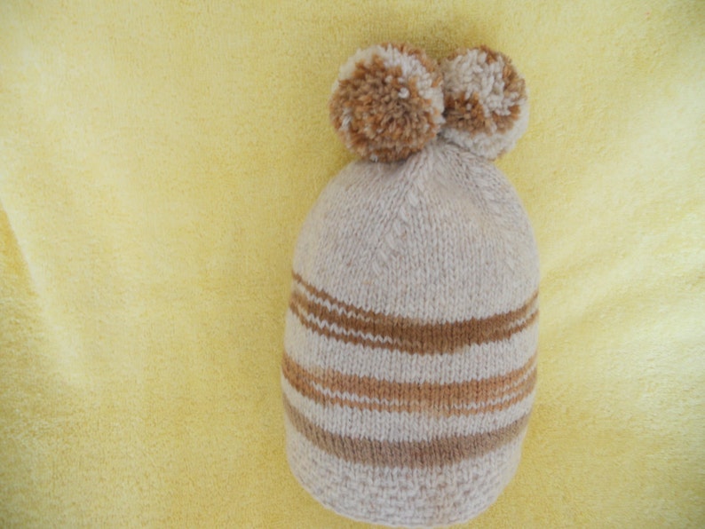 Hand Knitted Baby Hat. Winter Hat for 6 months old with two image 0