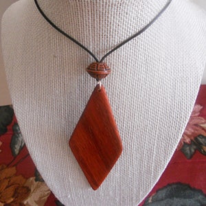 Exotic Wood Padauk Pendant. Double Sided Portable Red Wooden Jewelry Necklace.Handcrafted Necklace Wooden Art. Women's necklace. image 2