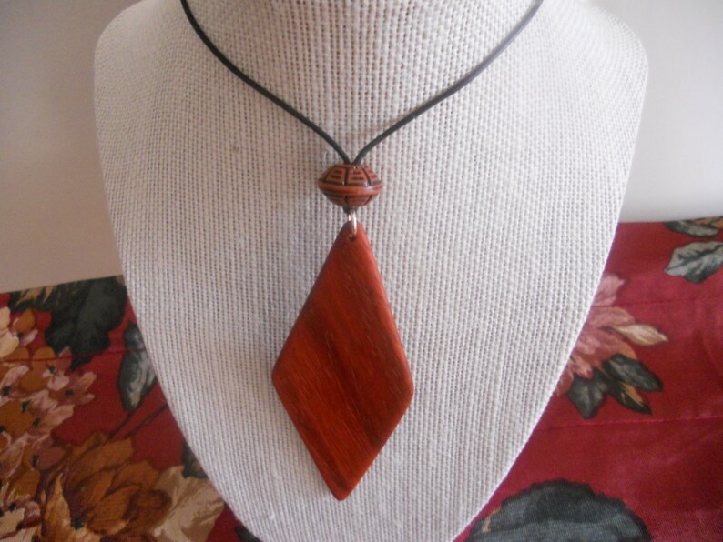 Exotic Wood Padauk Pendant. Double Sided Portable Red Wooden Jewelry Necklace.Handcrafted Necklace Wooden Art. Women's necklace. image 2