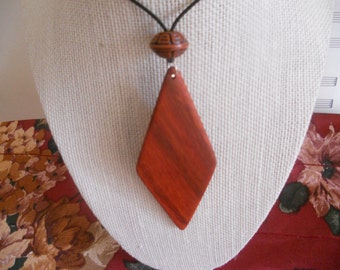 Exotic Wood Padauk Pendant. Double Sided Portable Red Wooden Jewelry Necklace.Handcrafted Necklace Wooden Art. Women's necklace.