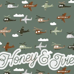 May include: A repeating pattern of airplanes, helicopters, and clouds in shades of brown, green, and gray on a muted green background. The text "Honey & Ivie" is displayed in a white, cursive font.