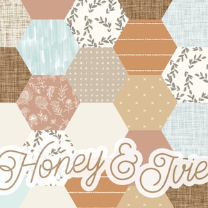 May include: A patchwork design featuring various hexagonal patterns in muted tones of brown, beige, and blue. Some hexagons have floral or leaf motifs, while others have stripes or cross patterns. The text "Honey & Ivie" is overlaid on the design.