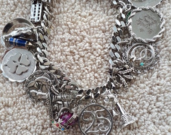 Sterling Charm Bracelet-Loaded with 17 Charms-Jewelled Crown, Windmill, Bus,Lucky Horseshoe/Heather, 1rs Man on Moon, Cross, Wagon, &quot;25&quot; +