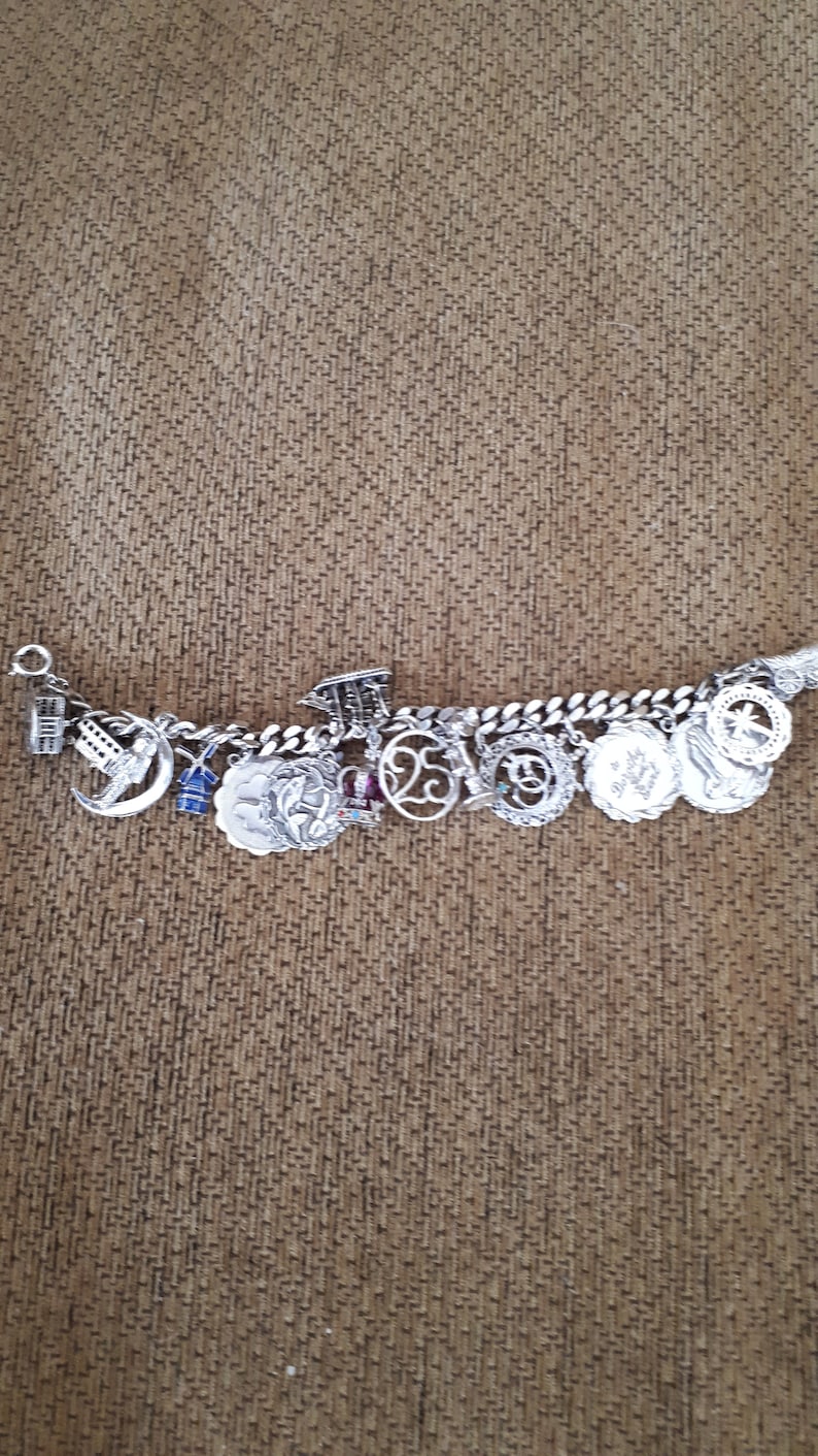 Windmill 1rs Man on Moon 25 + Cross Wagon Sterling Charm Bracelet-Loaded with 17 Charms-Jewelled Crown Bus,Lucky HorseshoeHeather