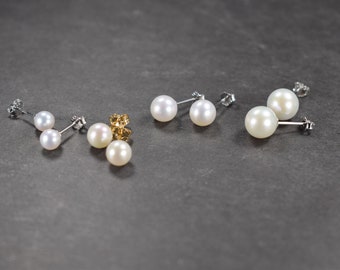 Aretes de perlas de agua dulce en oro de 14 k y pasadores de plata de ley.