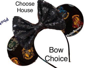 May include: Black sequin bow headband with a black and gold fabric headband featuring the Hogwarts house crests. Choose House. Bow Choice.