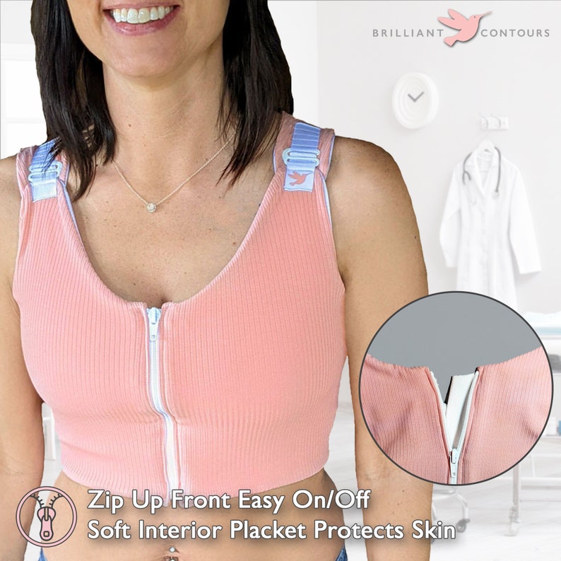 May include: A pink zip-up front bra with a soft interior placket to protect skin. The bra has adjustable straps with a blue and white design. The text "Zip Up Front Easy On/Off Soft Interior Placket Protects Skin" is visible below the image.