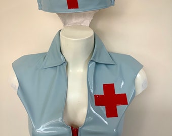 May include: A light blue vinyl nurse costume with a red cross on the chest and a matching hat with a red cross.