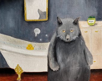 May include: A gray cat with yellow eyes stands in a bathroom with a claw foot tub. The cat is looking at the viewer. The tub has a yellow rubber ducky in it. There is a mirror on the wall behind the cat. The text "N2P" is on a small green pot on a shelf.