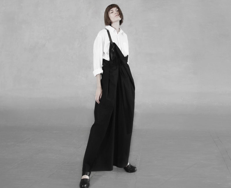 Avant Garde skirt Black overall skirt with single leather strap Deconstructed pinafore Apron style dress Lagenlook skirt Long blacAvant Garde Black Overall Skirt: Deconstructed Pinafore with Leather Strapk skirt