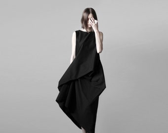 Extravagant asymmetrical black dress. Avant garde clothing
