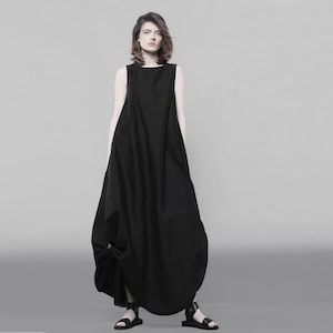 Avant Garde Black Maxi Dress: Asymmetrical Cotton Blend with Leather details