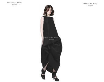 Extravagant black dress. Avant garde clothing