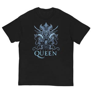 May include: Black t-shirt featuring a detailed light blue graphic of an alien-like creature with the text "KILLER QUEEN" in a matching light blue font. The design is centered on the front of the shirt.