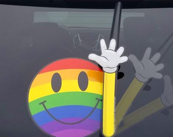 Have a Nice Day Rainbow Waving Smiley WiperTags attach to rear vehicle wiper blades. Detachable, interchangeable, weatherproof. Made in USA.
