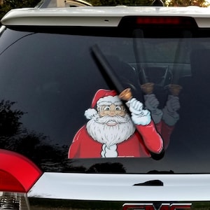 Les autocollants de Noël et le bras se fixent aux balais d'essuie-glaces arrière. Amovible, interchangeable, résistant aux intempéries.