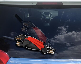 Flying Weiner Dog WiperTags attach to rear vehicle wiper blades. Detachable, interchangeable, and weather resistant. Made in the USA