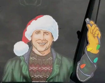 Light it Up Christmas Vacation WiperTags decal and arm attach to rear wiper blades. Detachable, interchangeable, and weather resistant.