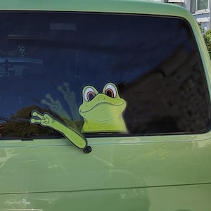 Peace Waving Green Frog WiperTags attach to rear vehicle wiper blades. Detachable, interchangeable, weatherproof. Made in USA.