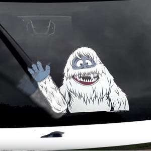 Abominable Waving Snow Monster WiperTags attach to rear SUV or van wiper blades. Detachable, interchangeable, weather resistant. Made in USA