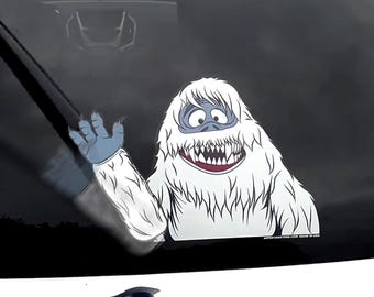 Abominable Waving Snow Monster WiperTags attach to rear SUV or van wiper blades. Detachable, interchangeable, weather resistant. Made in USA