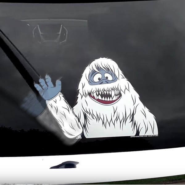 Abominable Waving Snow Monster WiperTags attach to rear SUV or van wiper blades. Detachable, interchangeable, weather resistant. Made in USA