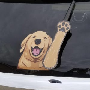 Bailey Golden Retriever Waving WiperTag decal and paw attach to rear vehicle wiper blades. Detachable, interchangeable, weather resistant.
