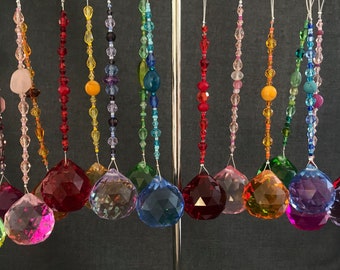 Seven coloured crystal decorations