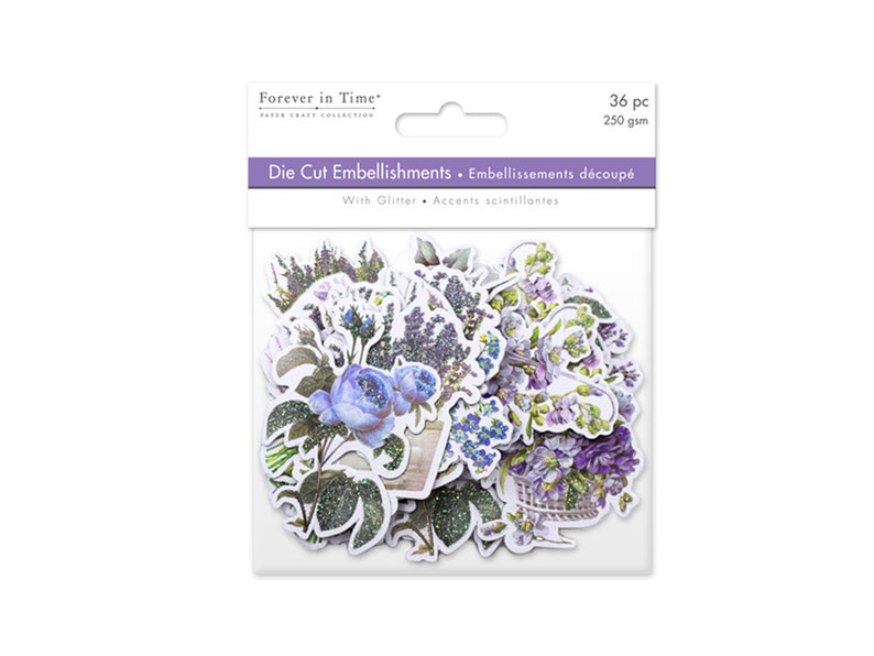 K&ouml;nnte beinhalten: Eine Packung mit 36 ausgestanzten Verzierungen mit lila und blauen Blumen mit Glitzerakzenten. Die Verpackung tr&auml;gt die Aufschrift "Forever in Time" und "Die Cut Embellishments".