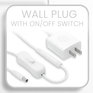 May include: White wall plug with an on/off switch and a white cord.