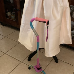 Pastel blues  &  pink FOLDING Quad Cane. Faux bling with multiple colors. Four metal legs. Won&#39;t slip on the floor. Cancer awareness gift.