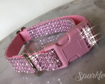 Pink Bling Dog Collar with light pink nylon, has a pink plastic buckle. Sparkling and elegant.