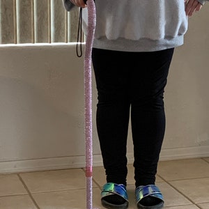 Pink Rhinestone Quad Cane. Four metal legs builds confidence. Very dependable, sturdy, won&#39;t slip or wobble. The best cane to gift!!