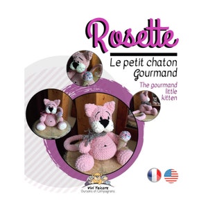 May include: A pink crocheted cat toy holding an ice cream cone. The toy is named "Rosette" and is described as "The gourmand little kitten".