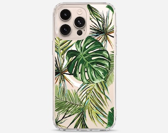 May include: A clear smartphone case featuring a vibrant botanical print of various green palm and monstera leaves. The design covers the back of the case, showcasing detailed illustrations of tropical foliage against a light, neutral background.
