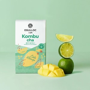 May include: A white box of Osulloc Kombu Cha Cala Mango tea with a green and yellow design. A stack of lime slices and whole limes are next to a pile of diced mango. The text on the box reads "Kombu cha" and "Cala Mango."