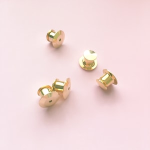 locking gold pin backs, set of locking pin backs, secure pin backs, enamel pin backs, gold pin backs, pin lock set, gold pin keepers, lock